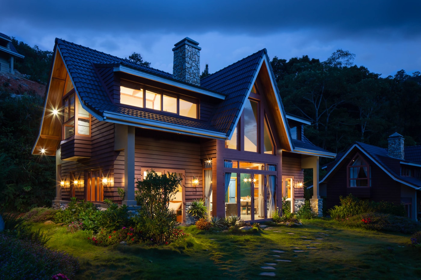Home with a well-maintained roof at dusk